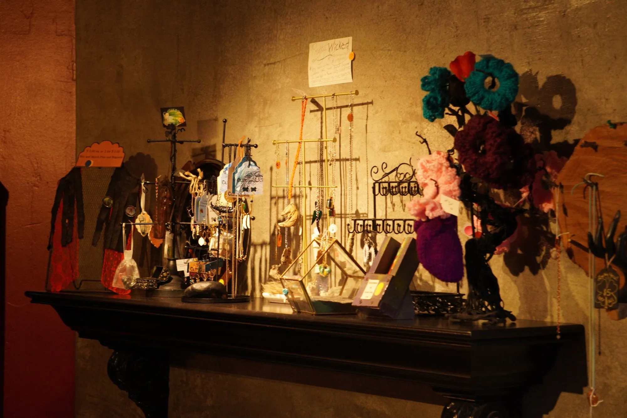 Hand-made jewelry and gifts for sale on the mantel
